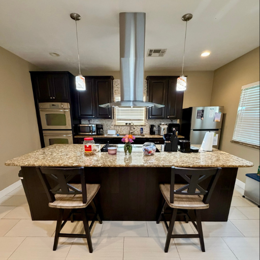 Granite kitchen island at the Cottage at Delasandri Kemah TX